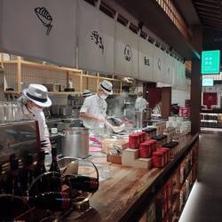 Chefs all hatted up in the open view kitchen