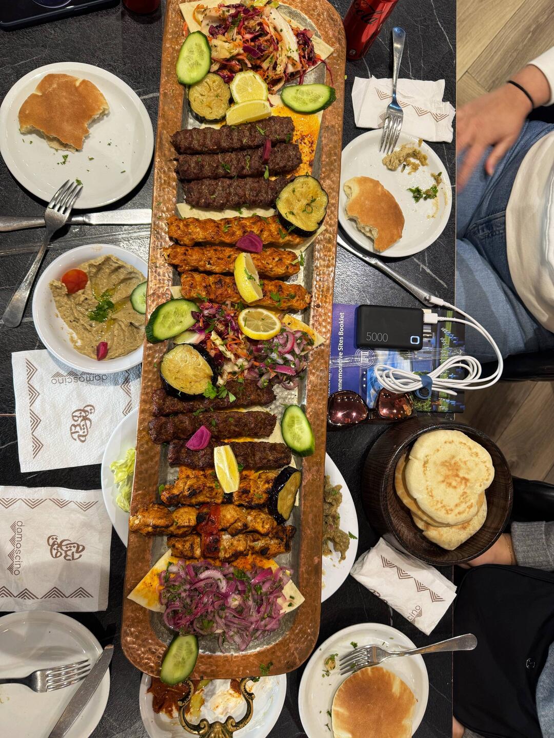 Dinner for 4, plus some friends! Beef and chicken skewers, bread, jasmine rice, & dipping sauce
