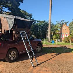 Camping with a mill on the background