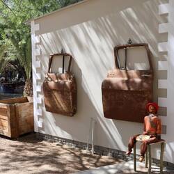 What every outdoor toilet needs, a couple of old car doors.