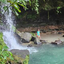 DJ ventured through the pool to the base of the waterfall