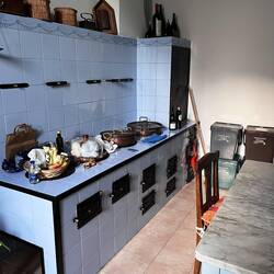 Old kitchen wood stove with pasta pots