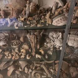 A few of the artifacts found in the apartment walls and grounds