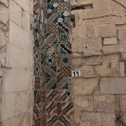 Wall mosaics behind walls