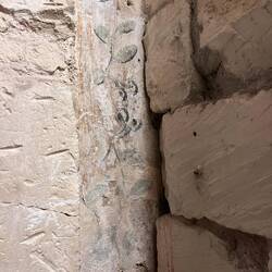 Uncovered painting in what was behind an apartment wall