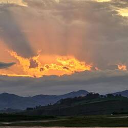 Beautiful sunset against the hills. Beautiful country