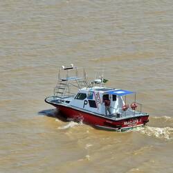 Amazon river pilot coming on board at Macapá