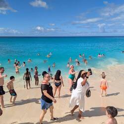 A few seconds earlier: all the tourists running upon hearing an arrival