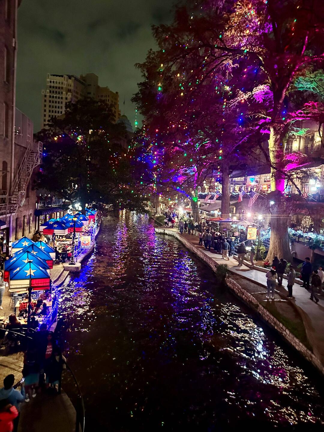 Twinkling Christmas lights on the San Antonio River walk