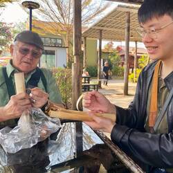 Beans and sticky rice with coconut milk, inside bamboo stocks