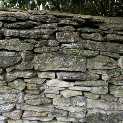 Stone fences with only mortar on the very top