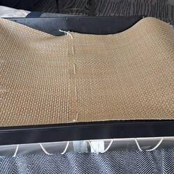 Creating the 'teak flooring' out of placemats for our boat.