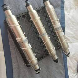 We used our drinking bottles as pontoons; the base was a hardware store purchase in Hilo.