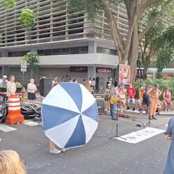 Every band needs an umbrella twirler.