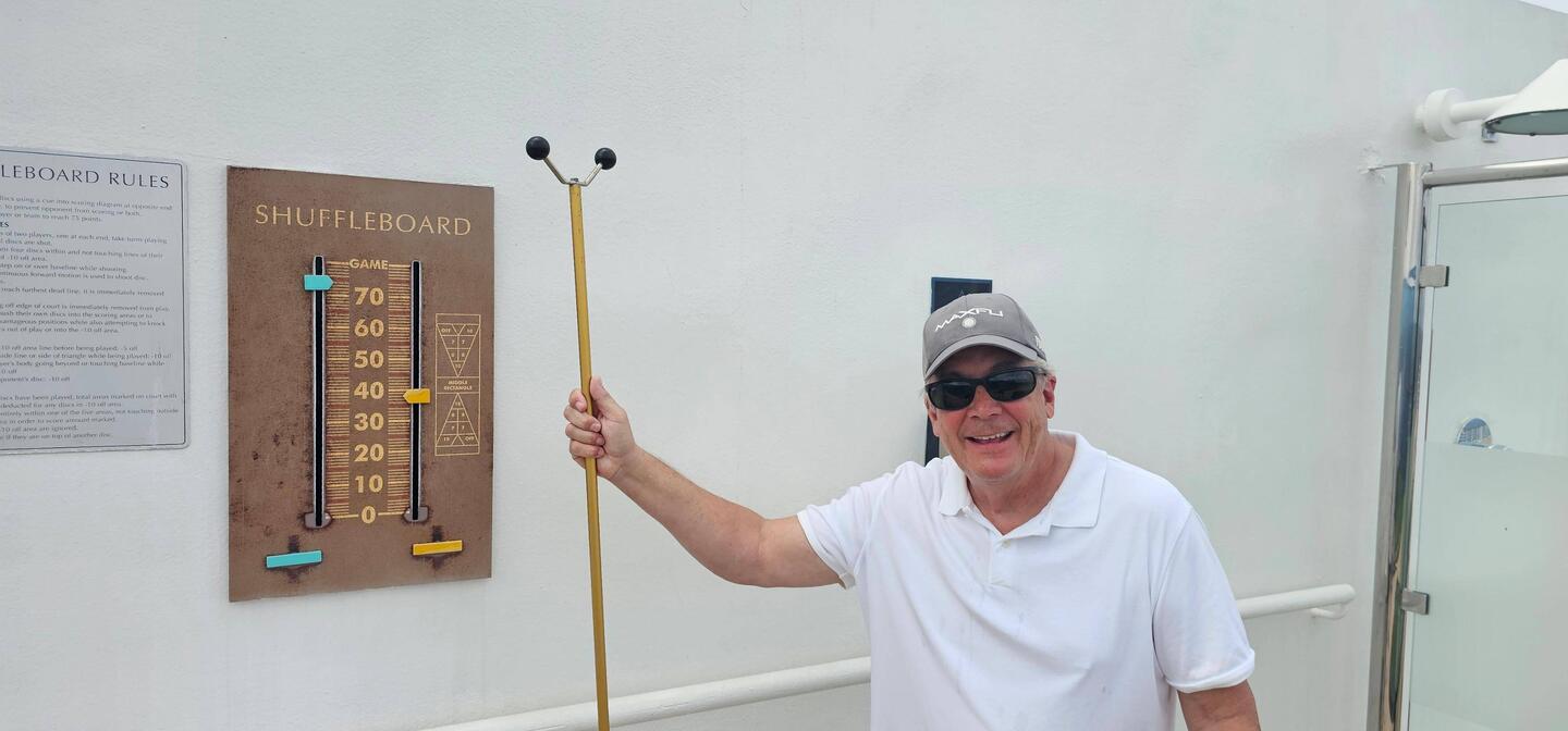Chris wins in shuffleboard