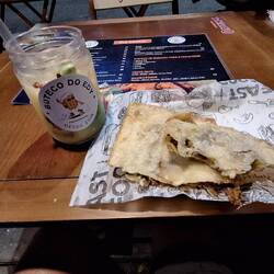 Pastel, a sort of deep fried crepe, this was pork and cheese but they can be savoury or sweet.