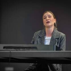 Martina singing at the Community Center — Bilje, Croatia.