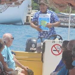 Our boat driver gives us a brief layout of our itinerary.