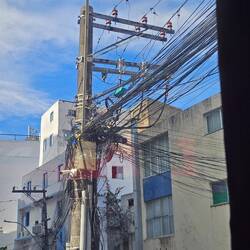 Utility pole working hard