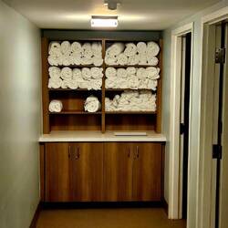 Bath house for marina with plush resort towels