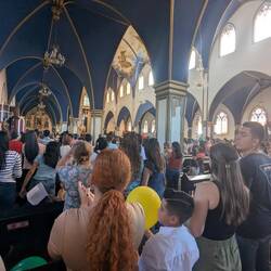 A packed church service celebrating children