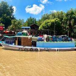 Boat supermarket - note bottled water as no drinking water on the islands.