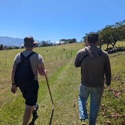 Bring escorted on the neighbors land. They even lent is walking sticks