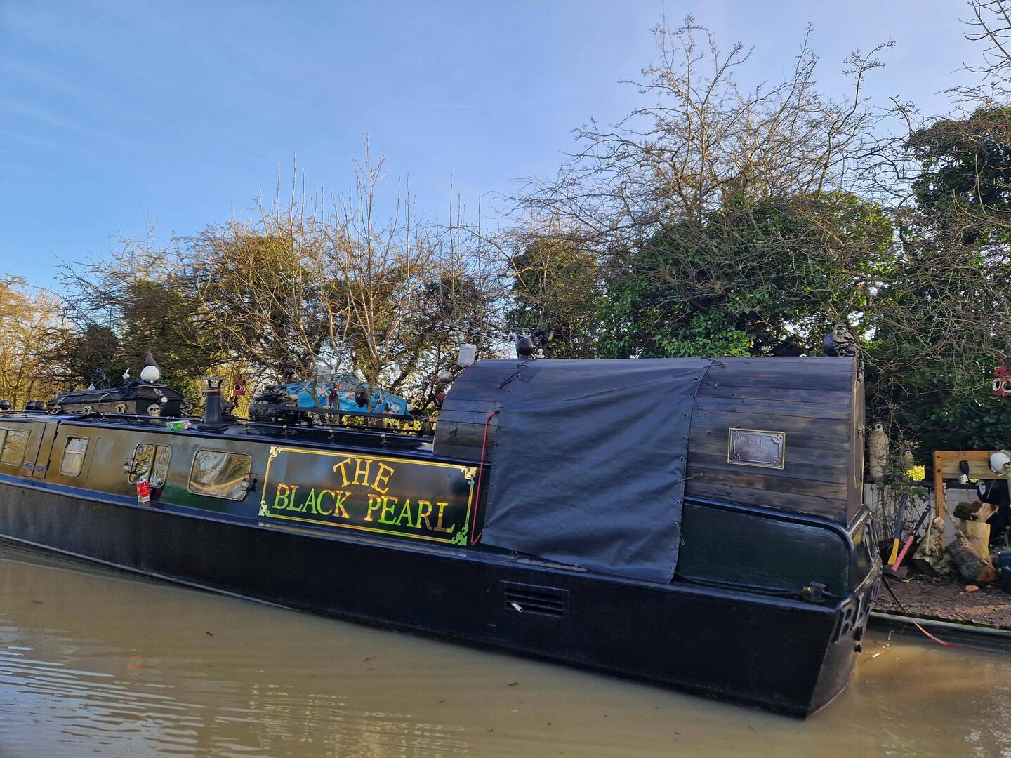 Steam Punk boat. Zoom in to see the coffin and other 'decorations'