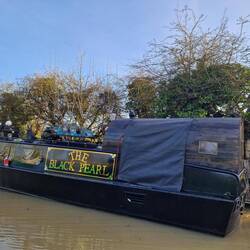 Steam Punk boat. Zoom in to see the coffin and other 'decorations'