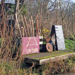 Boaty business selling hand carved walking staffs on the bank.