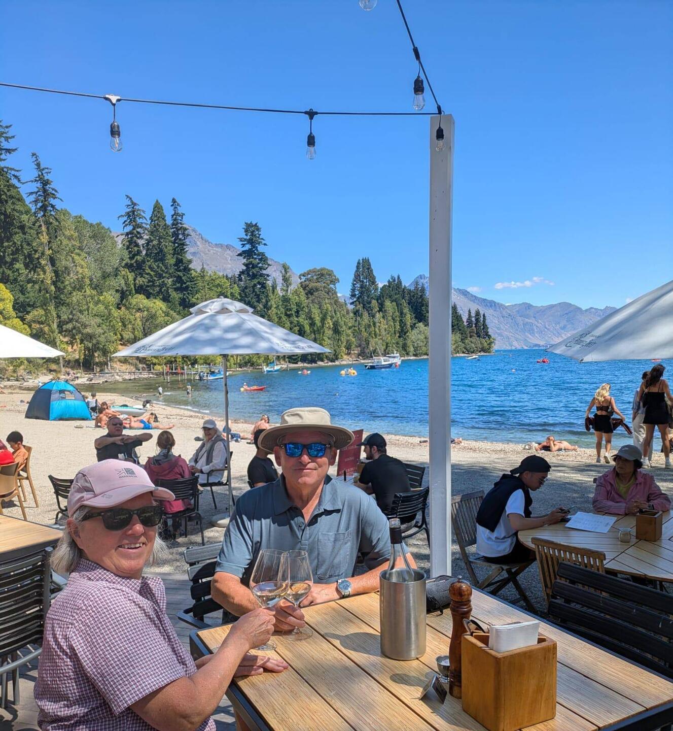 Enjoying a glass of rosé on the lakeshore.