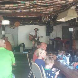 Late afternoon entertainment by a friend of Wayne and Jo's