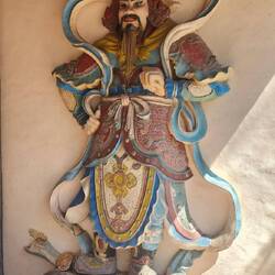 Warrior mandarin guarding the gates of the main sanctuary of Thien Mu Pagoda in Hue