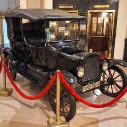 A model T Ford, in the hotel reception. Where else would you put it!