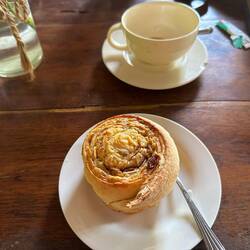The very best cinnamon rolls by the only baker on the island. He makes only 30 each day.