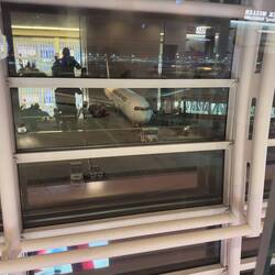 JA616J at Gate 113 in Haneda.