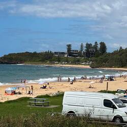 The view of Headlands Hotel in the distance from Sharky's beach