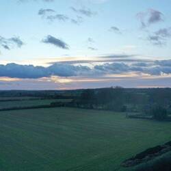 Sunset with the Rising Sun pub on the right