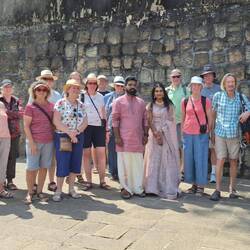 The tour group with the newly engaged couple