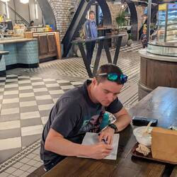 Rob writing in his diary
