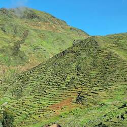 Natural terraces on the mountain slope.