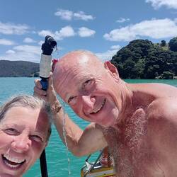 hosing off the salty journey... giving klepper and ourselves a cold shower!