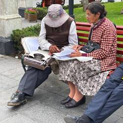 Six or seven people with typewriters hang out at the Square to type documents for people