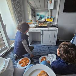 Room service while we watch The Gods Must be Crazy.