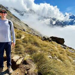 Our first glimpse at Hooker Valley below as the clouds are rolling through