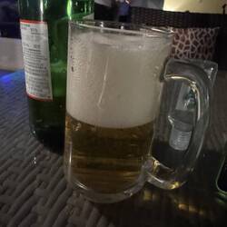 Waiter dude insisted on pouring my beer, then did a piss-poor job of it. Hmph.