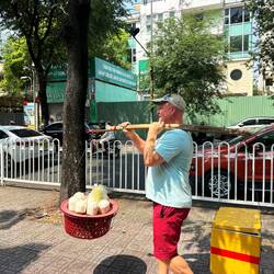Bryan got conned into carrying this guys load, then of course, we had to buy some coconut water