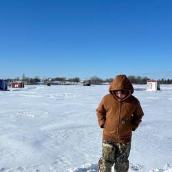 Fishing community on the lake with a 2 foot depth of frozen lake!! Makes me NERVOUS!!