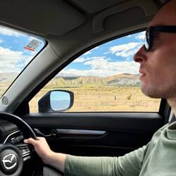 Chris driving like a pro on the left side of the road now!