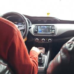 The taxi driver had music videos playing on the dash's LCD panel. I'm sure that's not legal at home.